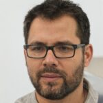 Carlos M.
